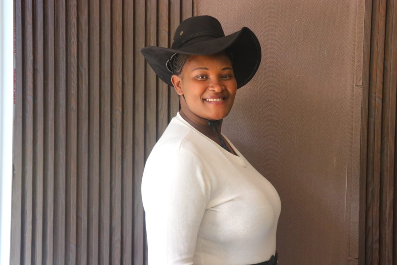 Portrait Woman Cowboy Hat Indoor Side Smiling