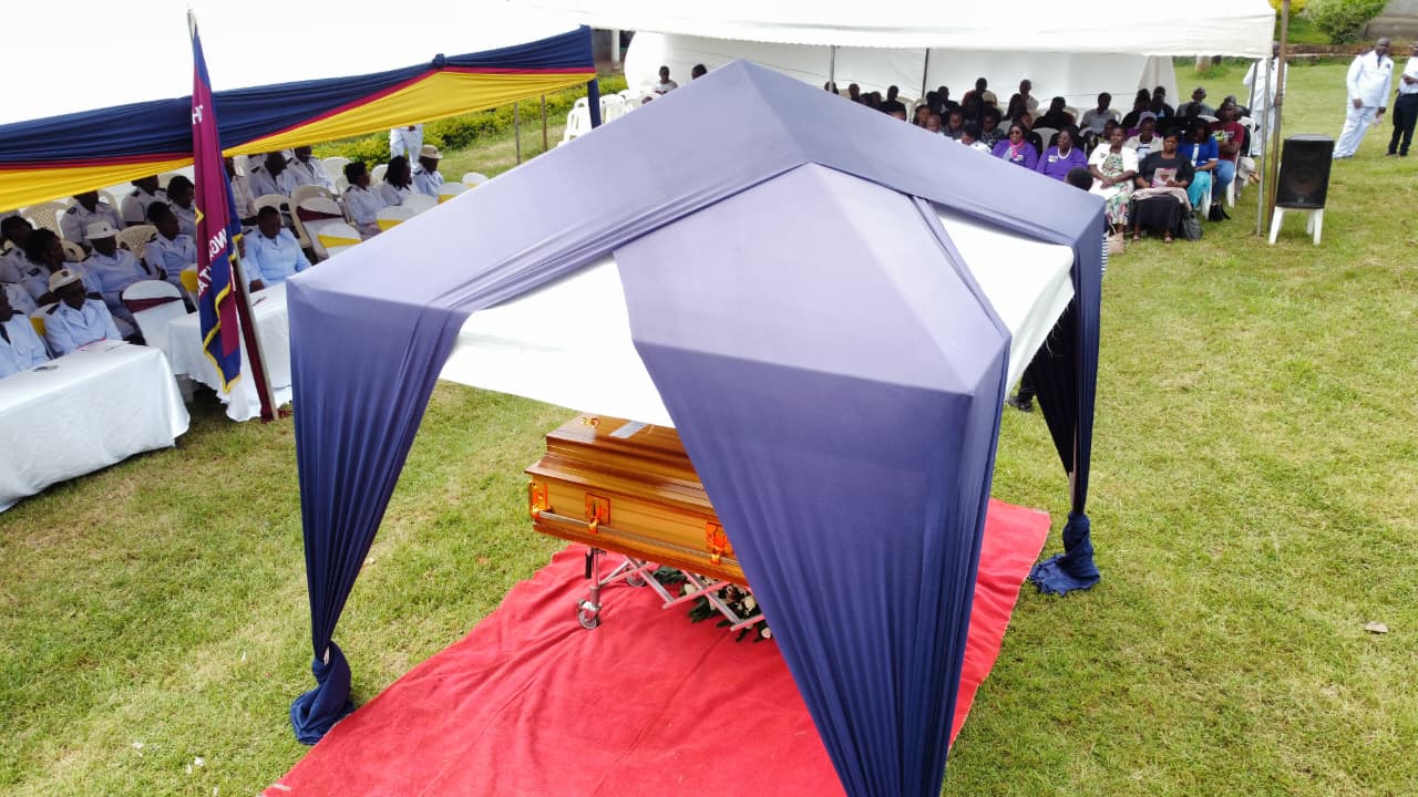 Funeral Photo Casket Under Canopy View1