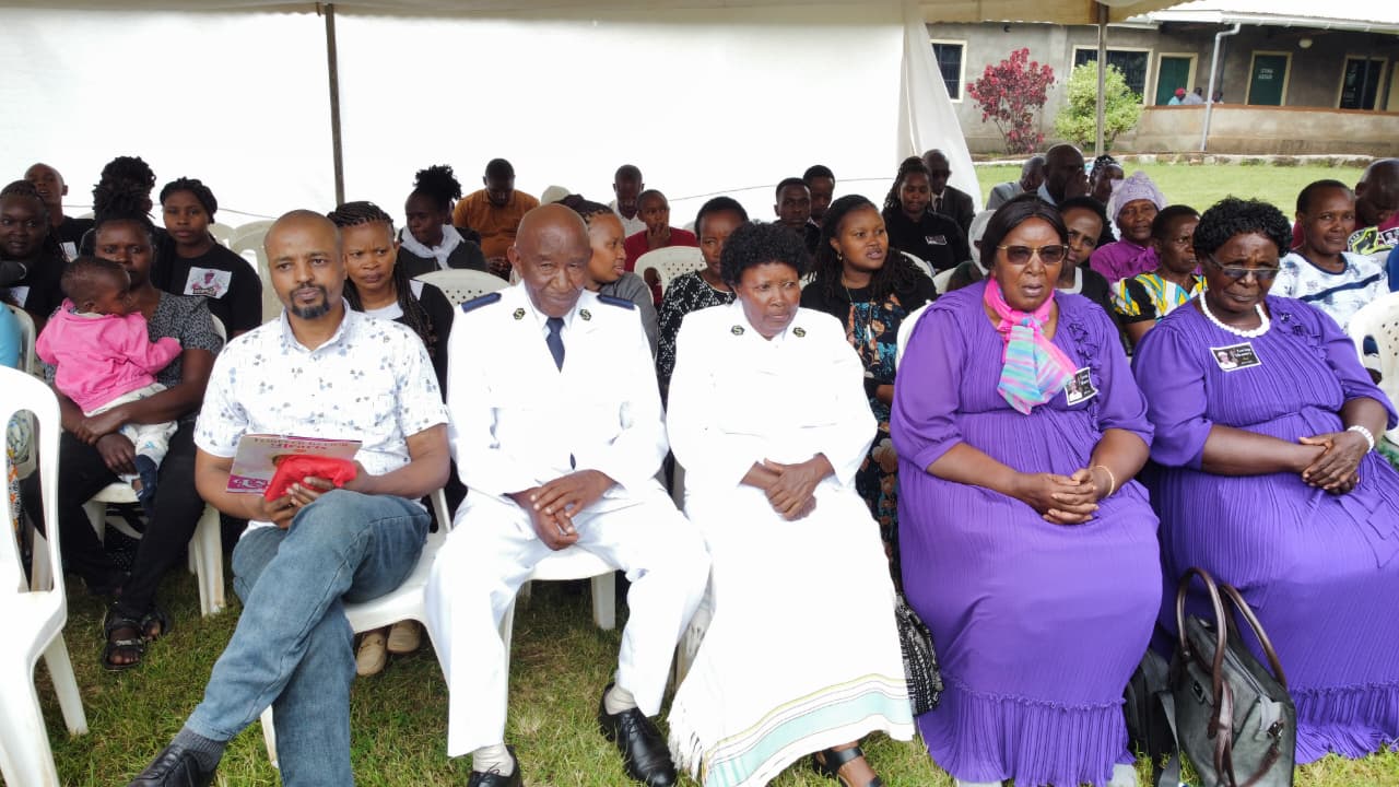 Group Photo Funeral Attendees Purple Dresses View1